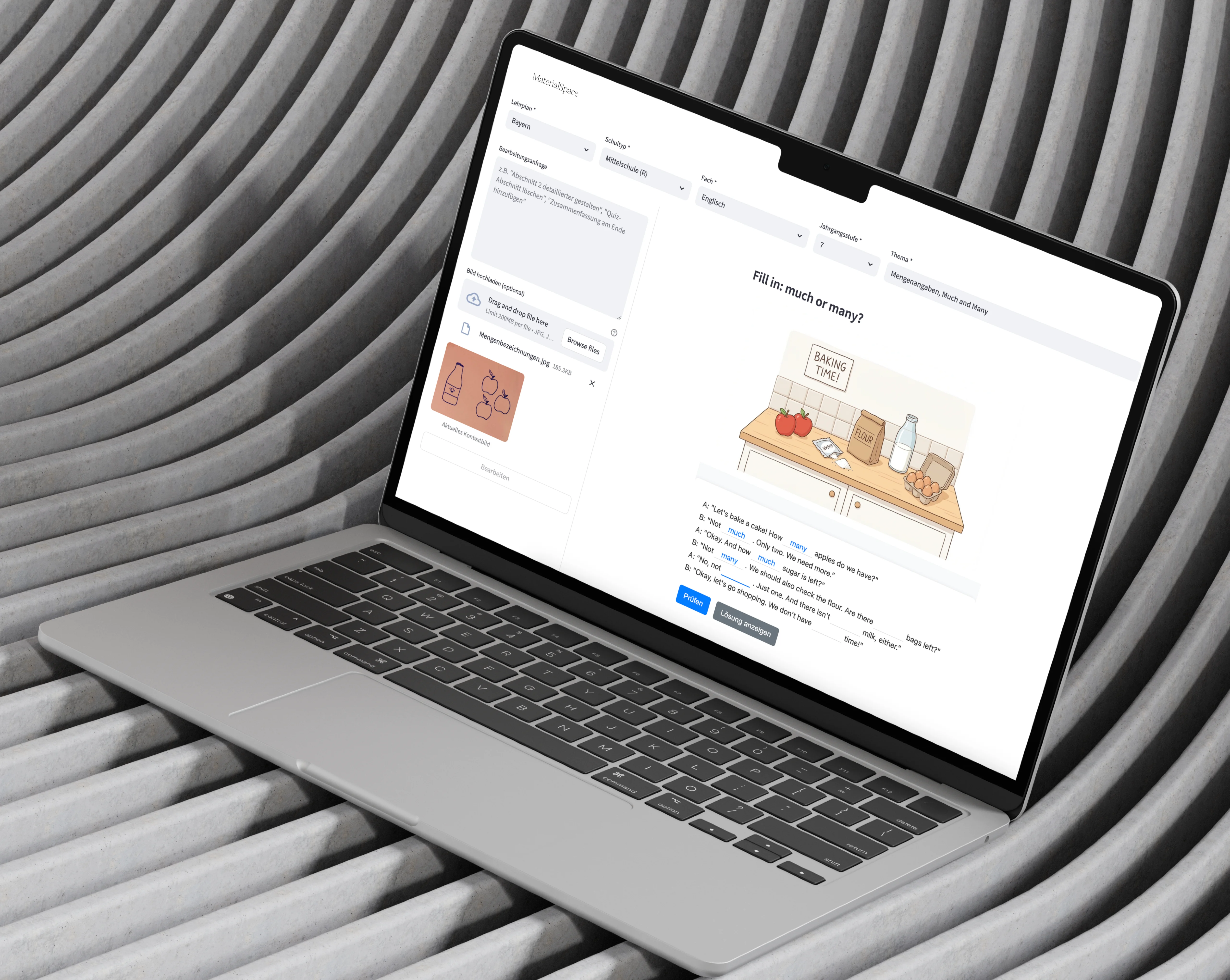 MaterialSpace open on a MacBook: the configuration panel with curriculum, school type and grade on the left, a generated English worksheet on the right